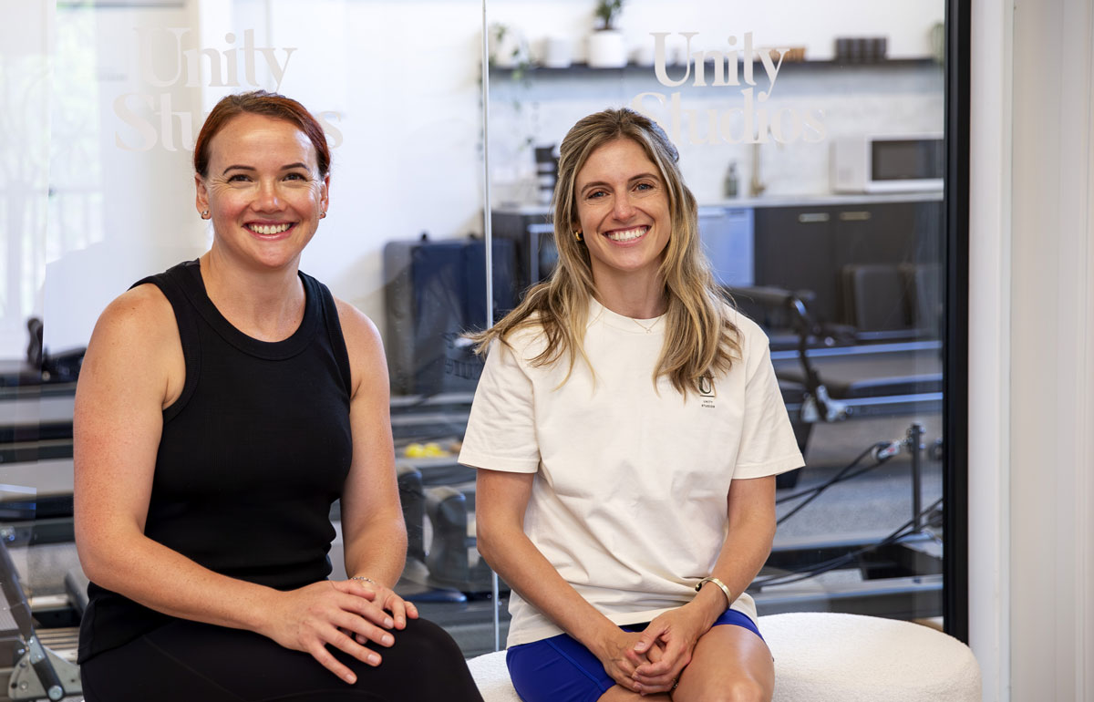 Unity-Studiios-About-Us-Sophie-and-Caitlin-candid Unity Studios Caitlin Fris & Sophie Fogerty — Pregnancy and Postnatal Physio, Reformer and Mat Pilates, Yoga, Auckland